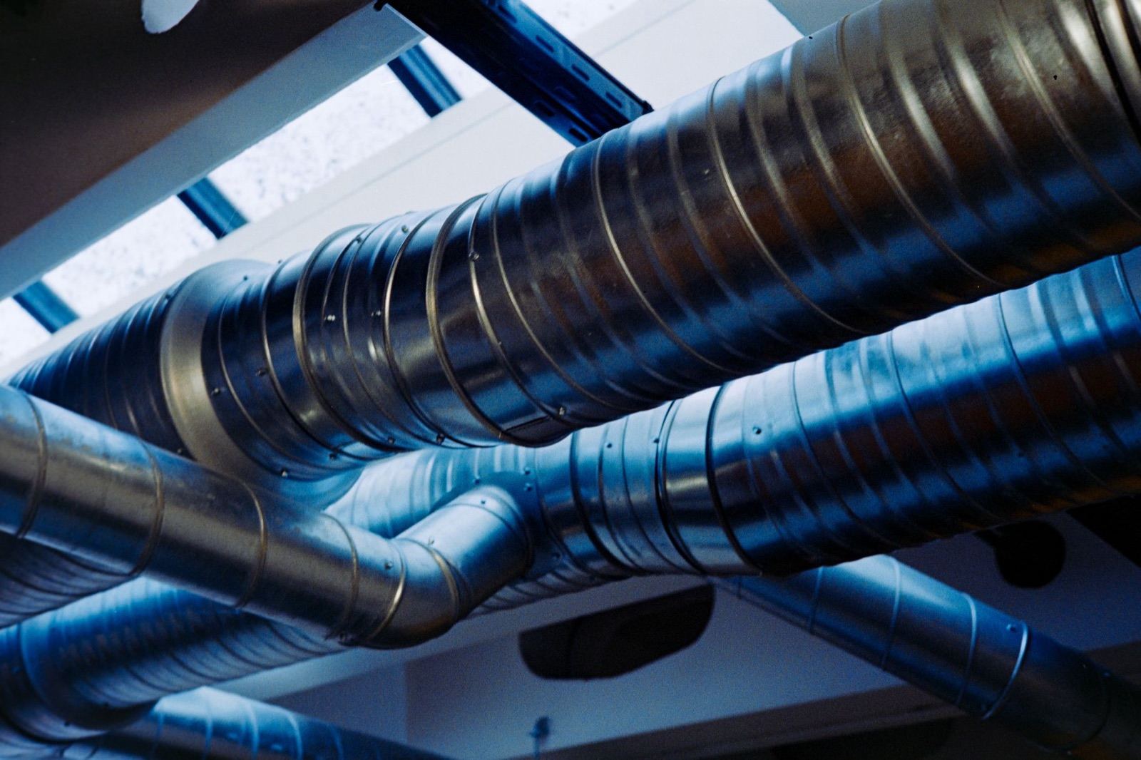 Round metal air ducts inside a building